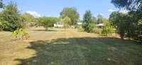 At end of  back yard looking back to the home.