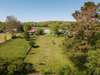 Aerial view of back yard , home is white. This shot is a couple of years old.