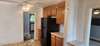 Another view of kitchen. Hallway in back goes right to master bedroom, left to other bedroom and you can see into the full bath.