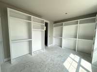 Primary Walk-In-Closet / Dressing Room is a whopping 15' x 11! Fabulous Built-Ins will organize every season of clothes!