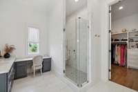 Primary bath shower has massage jets. Two huge primary closets with custom built-in cabinetry