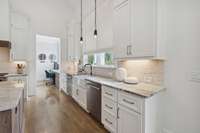 Farm sink and TWO ASKO dishwashers plus under counter lighting. This home is fantastic for entertaining