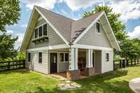 This 988-square-foot guest house offers a versatile living area perfect for guests or extended family.