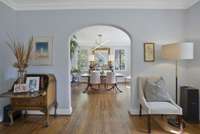 Classic Tudor home archway into the dining area from the living room.