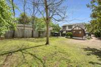 View from the back left corner of the lot. The sellers built and own all the backyard fences