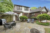 Large Stone back Patio off the Kitchen/Laundry/Pantry area with Gas Grill!