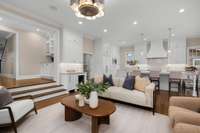 The den’s view into the kitchen enhances the open layout, making it perfect for entertaining. The seamless flow between rooms enhances the home's functionality and charm. Cook and socialize seamlessly in this thoughtfully designed space.