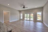 The second basement living area! Complete with wet bar and slider doors to more outdoor living space.