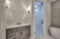 His and her sink areas with custom cabinetry.