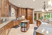 Custom designed, stained wooden cabinets flush to ceiling.