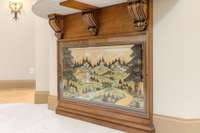 The glass front showcases original handcrafted 3-dimensional artwork from Bavaria, Germany.