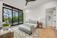 Guest house bedroom.  Sliding doors opens up to the deck area over looking the main house backyard and pool.