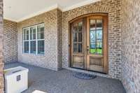 Covered Front porch- can't you see a beautiful porch swing here?