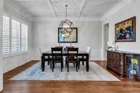 Formal Dining room with Butler's Pantry tucked on side.