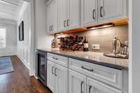 Butler's Pantry with wine refrigerator.