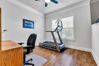 second bedroom on main level being used as a workout area/ second home office