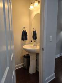 Powder room on main level for guests.