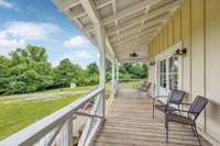 This expansive covered front porch exuded Southern charm at its finest! 5901 Givens Rd Lascassas, TN 37085