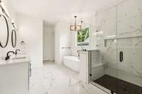 Soaking tub, glassed in shower, and oh so spacious!