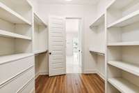 Walk-in closet with built-ins...