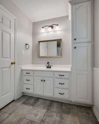 Second full bathroom upstairs— GREAT cabinet space