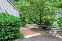 Privacy abouts and overlooks beautiful and private tree filled back yard.