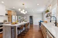 Large island for ample seating. This kitchen has two full sinks; one in island making food preparation for large events a breeze.