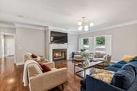 Large living room with fireplace.