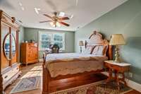 Second floor bedroom offers a private getaway for any house members or guests.