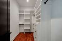 Master closet with lots of built-in storage