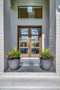 Grand front entrance with double doors