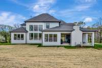 Beautiful backyard view of the house - Perfect for a pool!