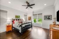 Primary bedroom on the main level has ample space to enjoy