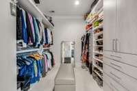 Custom walk in closet with more than enough space for all of your shopping hauls, shoes, handbags and hats