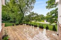 Oversized stone patio with green views