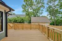 Wrap around deck overlooking backyard