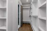 Spacious walk-in Primary closet with and additional laundry option included.