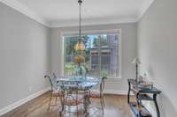 Extra large breakfast area off the kitchen and family room with tons of natural light.