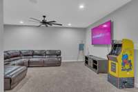 The bonus room is L-shaped, enormous and accommodates sectional seating and plenty of room to play.