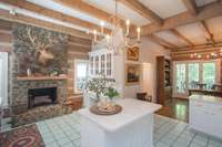 Kitchen with cozy stone fireplace