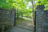 Dry Stacked Stone Wall and Iron gate leading to the front pastures and barn