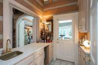 Wet bar, in between the kitchen, great room and dining room (laundry is to the right)