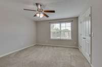 Primary bedroom with a nice large window for more natural sunlight.