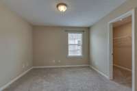 This is the second bedroom which has it's own bath that could be a second primary space with a nice large closet.