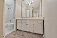 The vanity offers lots of storage in the bathroom!