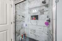 New tile shower with sliding glass doors