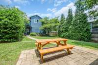 Lots of room to play here in the fenced backyard. The detached 2-car garage seen here has extra storage and features an additional 587 sq ft of living space.