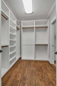 A look at the primary closet with great organizational features.