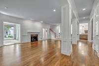 Family Room with opening to Sunroom and Kitchen