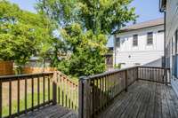 Nice shaded deck on rear of home.